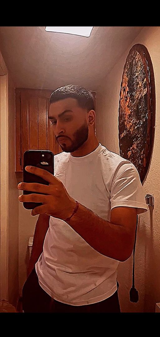 Client selfie after a taper and beard line up