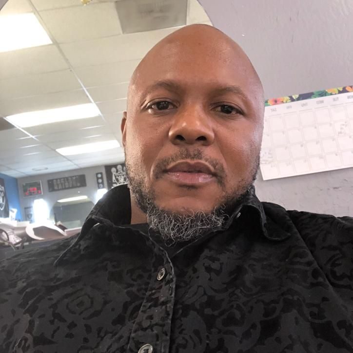 One of the owners at Top Notch Barber Shop